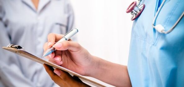 Doctor prescribes treatment for back pain