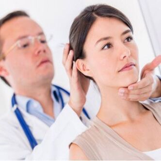 Neurologist examining a patient with neck pain
